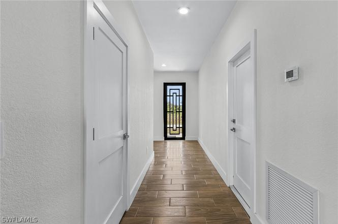 Bamboo Model interior hallway with luxury vinyl flooring