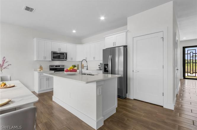 Bamboo Model kitchen detail — modern cabinetry and finishes