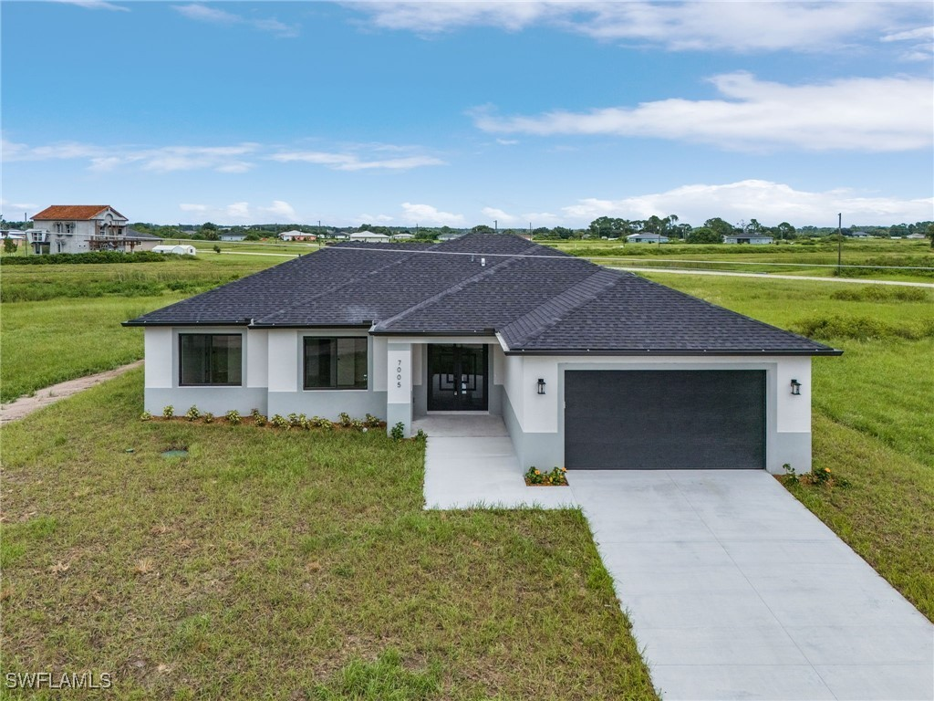 The Oasis Model — Modern Florida Home by Elite Premium Homes
