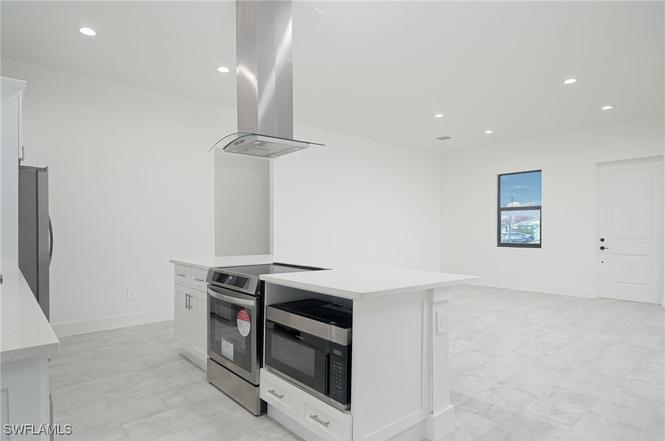 Justice Model kitchen angle 2 — premium finishes
