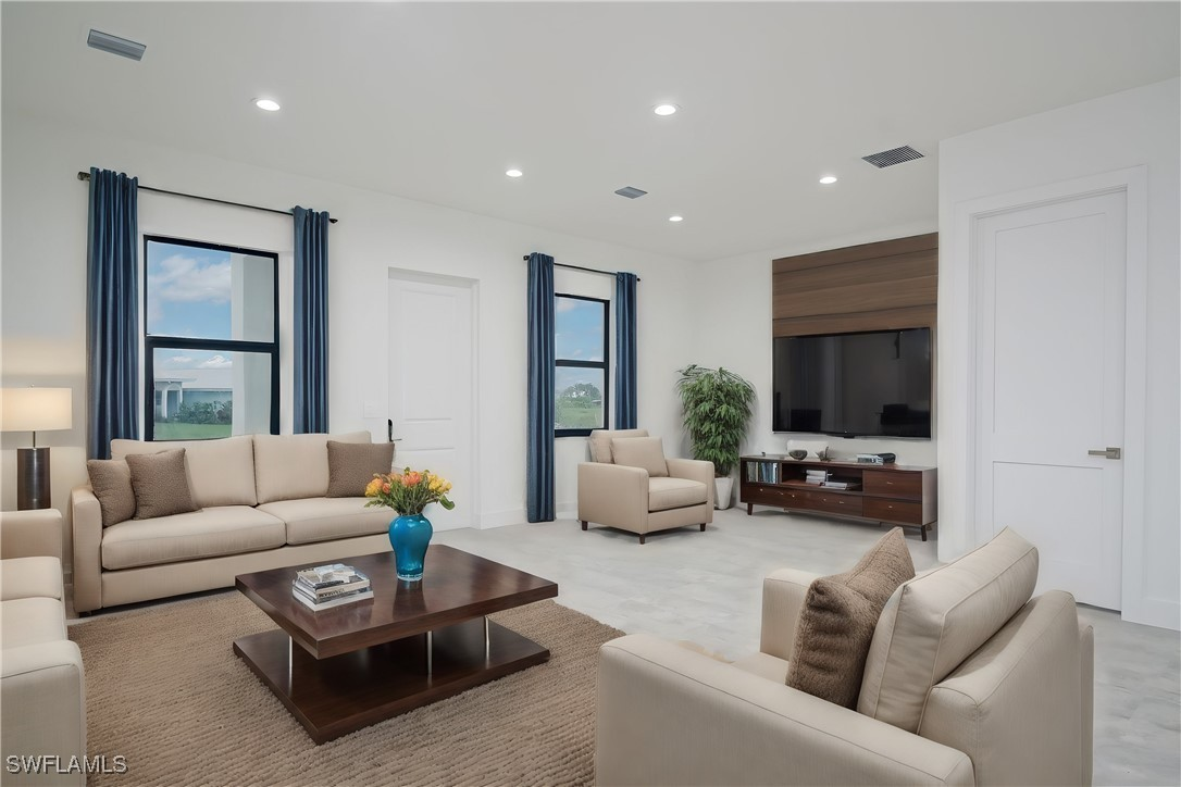 Justice Model living room — bright open living space